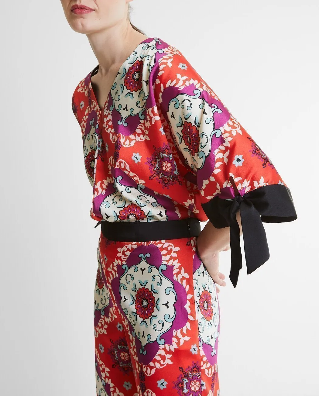 BLUSA ESTAMPADA LAZO EN MANGA