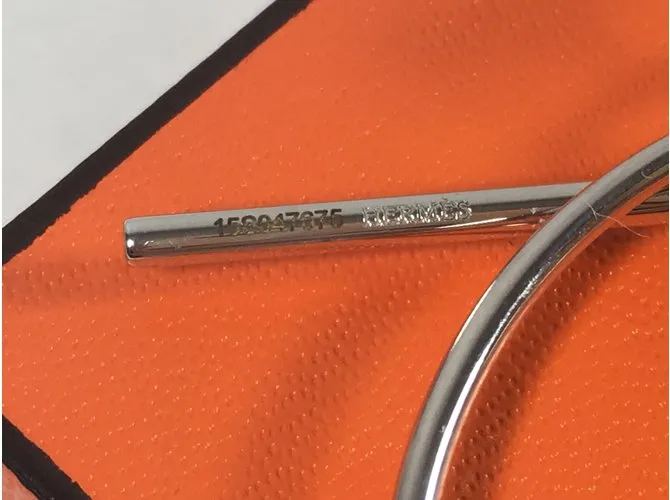 Hermès Pendientes de lazo Plata 