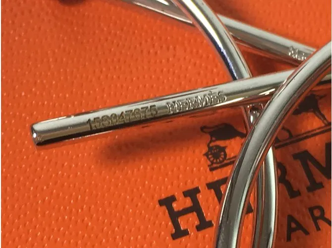 Hermès Pendientes de lazo Plata 