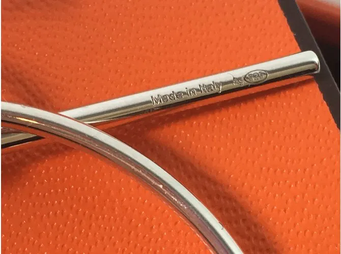 Hermès Pendientes de lazo Plata 