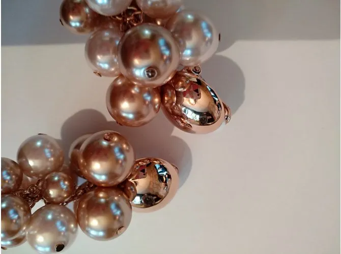 Oscar de la Renta Pendientes de adorno de oro Dorado 